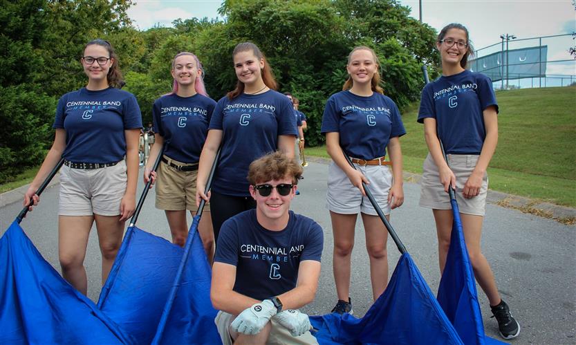 Students celebrate while on a homecoming parade float